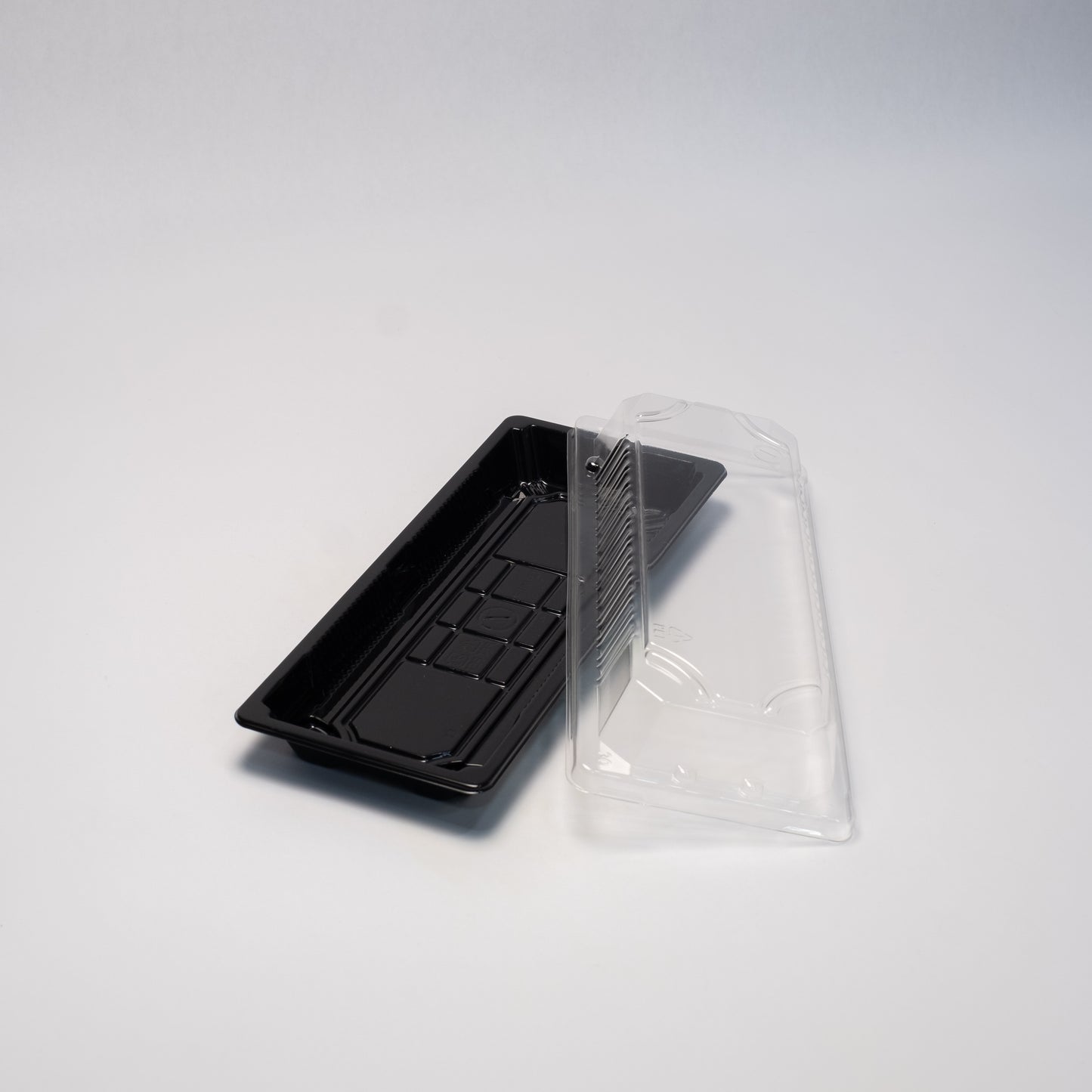 TZ 001 -8 3/4 inch x 3 3/4 inch x 7/8 inch sushi container